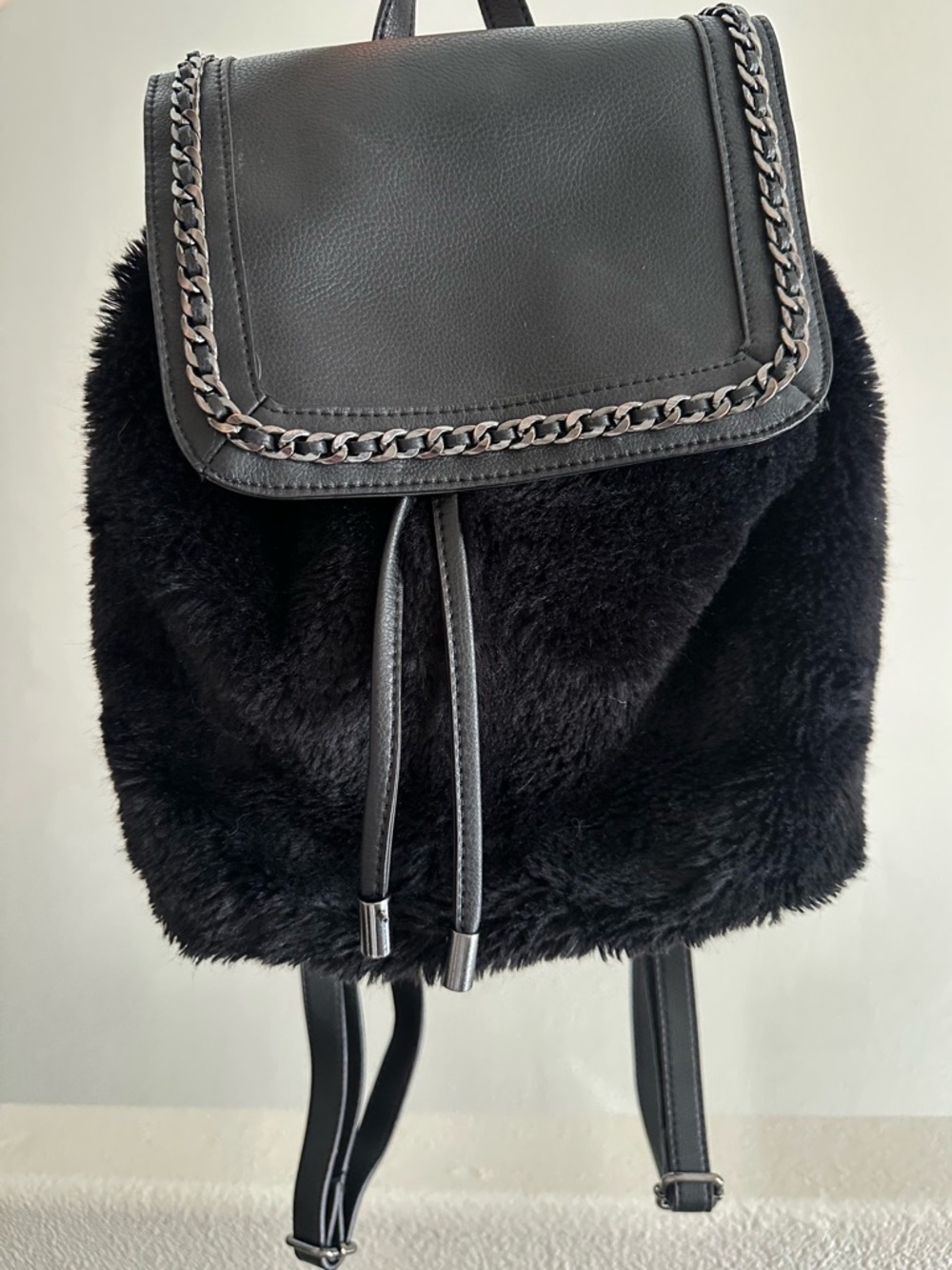 Jessica Simpson sleek black faux fur backpack